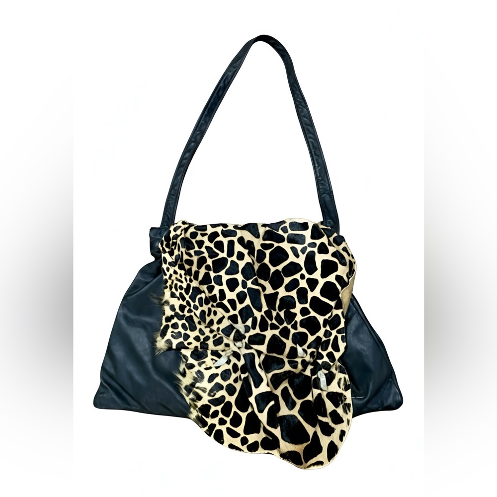 Black Leather Shoulder Bag with Leopard Print Accent it is authentic